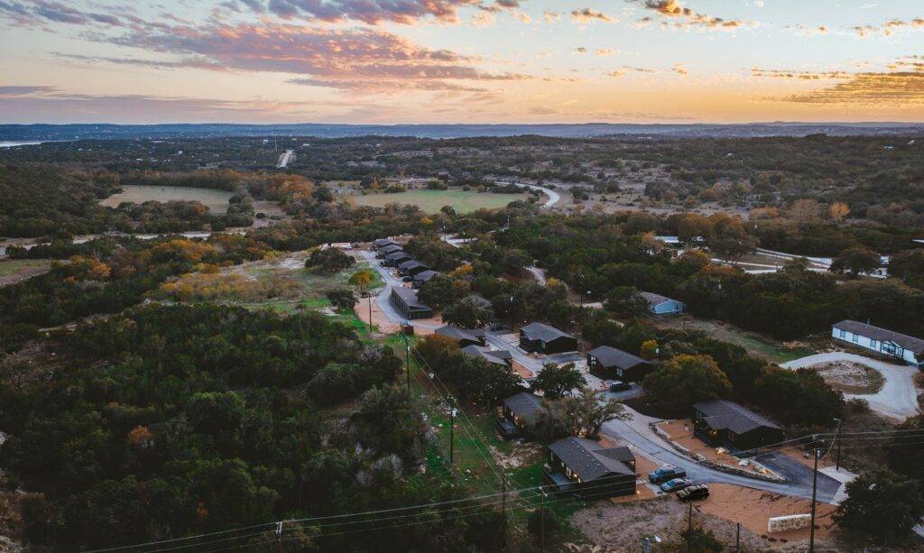 Aerial view of Starlight Horizon cabins in Canyon Lake Texas at sunset