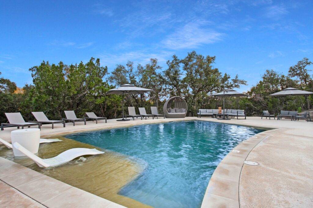 Resort style pool and lounge area at Starlight Horizon in Canyon Lake Texas