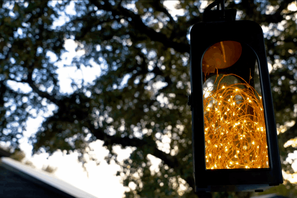 Outdoor lantern with warm string lights at Starlight Horizon in Canyon Lake