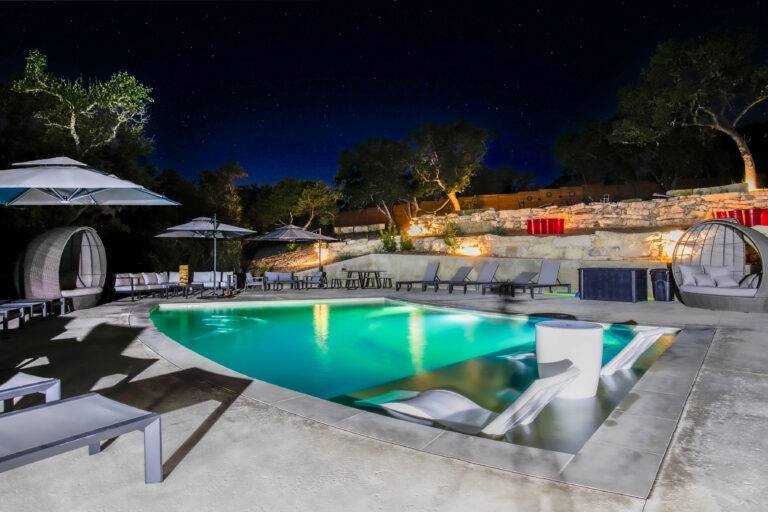 Resort style pool at night at Starlight Horizon in Canyon Lake Texas