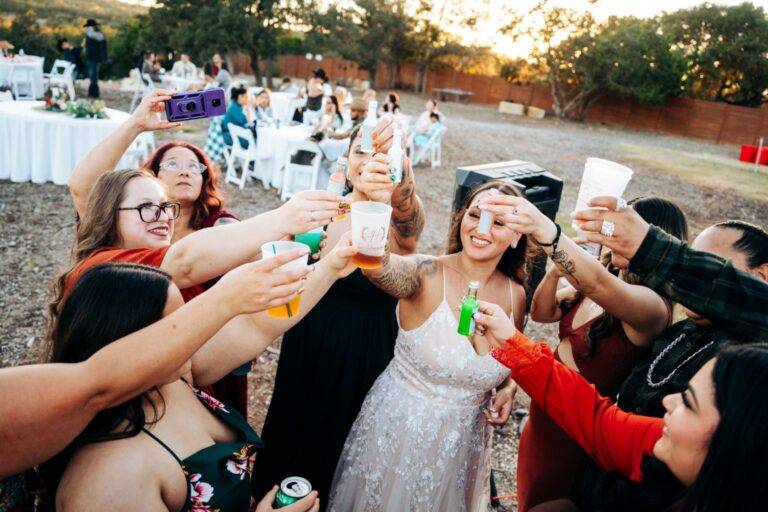 Bride celebrating with guests at Starlight Horizon wedding venue in Canyon Lake