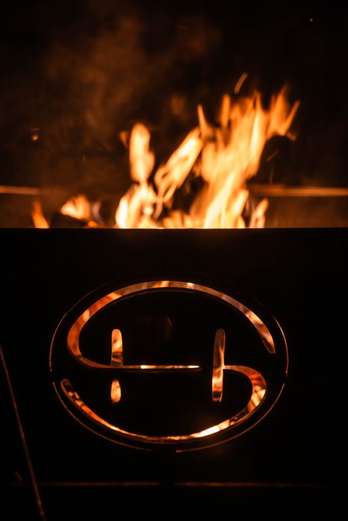 Backyard Firepit at Night at Starlight Horizon, a boutique cabin resort near Canyon Lake, Texas