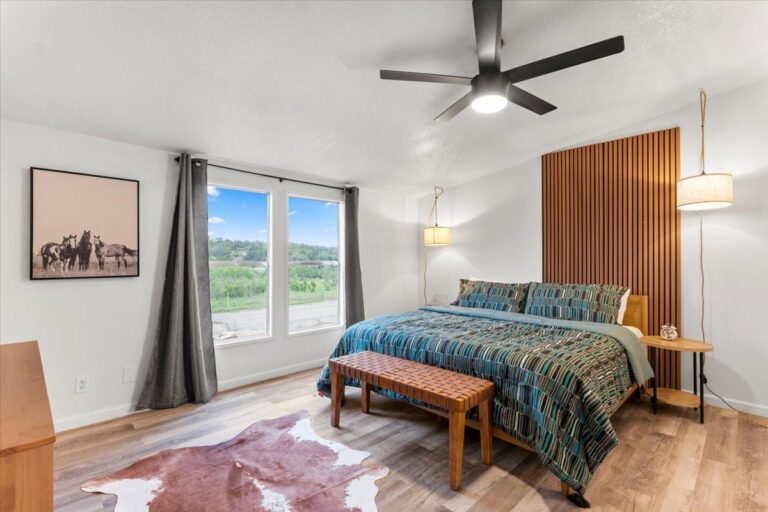 Primary bedroom in Cabin J at Starlight Horizon near Canyon Lake, Texas