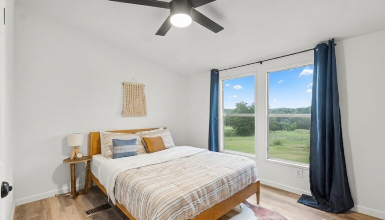 Queen bedroom in Cabin J at Starlight Horizon near Canyon Lake, Texas