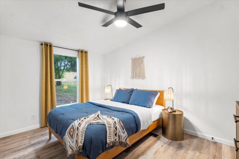 Queen bedroom in Cabin J at Starlight Horizon near Canyon Lake, Texas