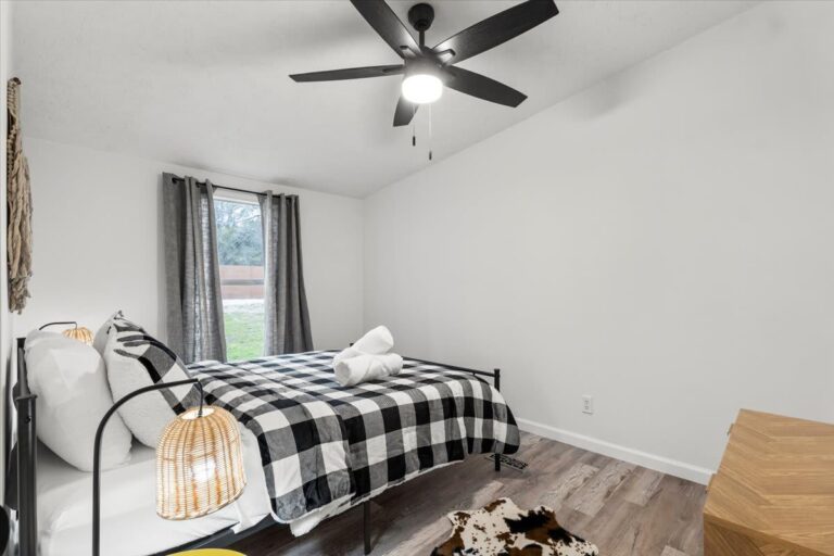 Queen bedroom in Cabin K at Starlight Horizon near Canyon Lake, Texas