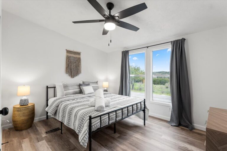 Queen bedroom in Cabin K at Starlight Horizon near Canyon Lake, Texas