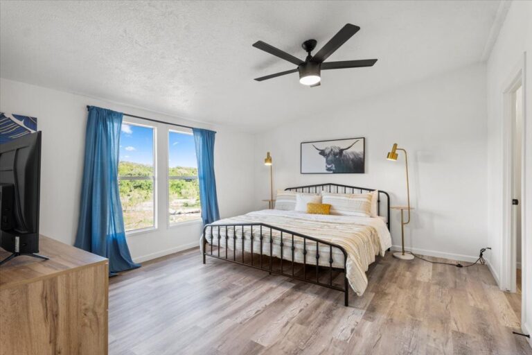 Primary bedroom in Cabin L at Starlight Horizon near Canyon Lake, Texas