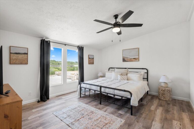 Primary bedroom in Cabin N at Starlight Horizon near Canyon Lake, Texas