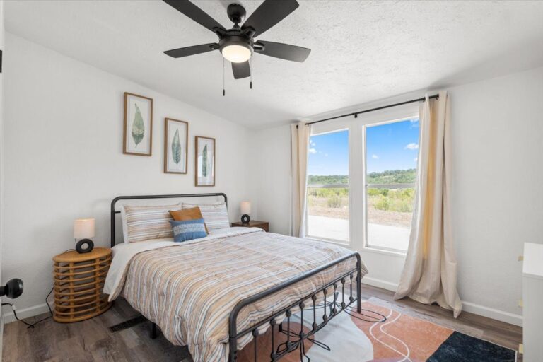 Queen bedroom in Cabin N at Starlight Horizon near Canyon Lake, Texas