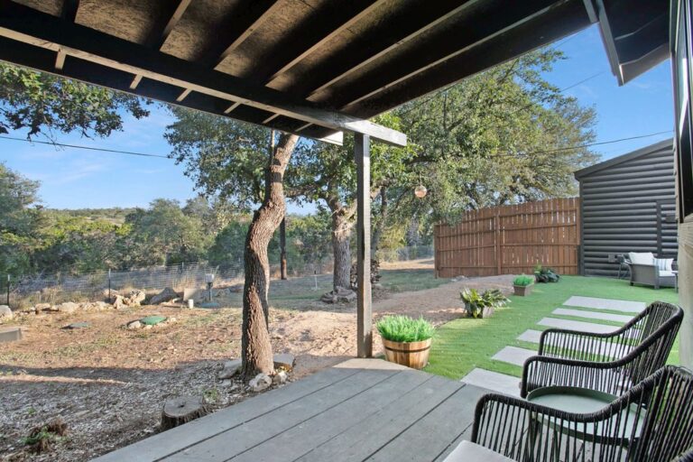 Backyard porch at the Hot Tub Cabin at Starlight Horizon near Canyon Lake, Texas