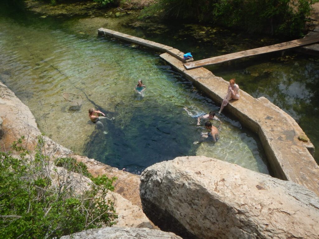 Jacob's Well natural spring near Wimberley, Texas, elevated angle view