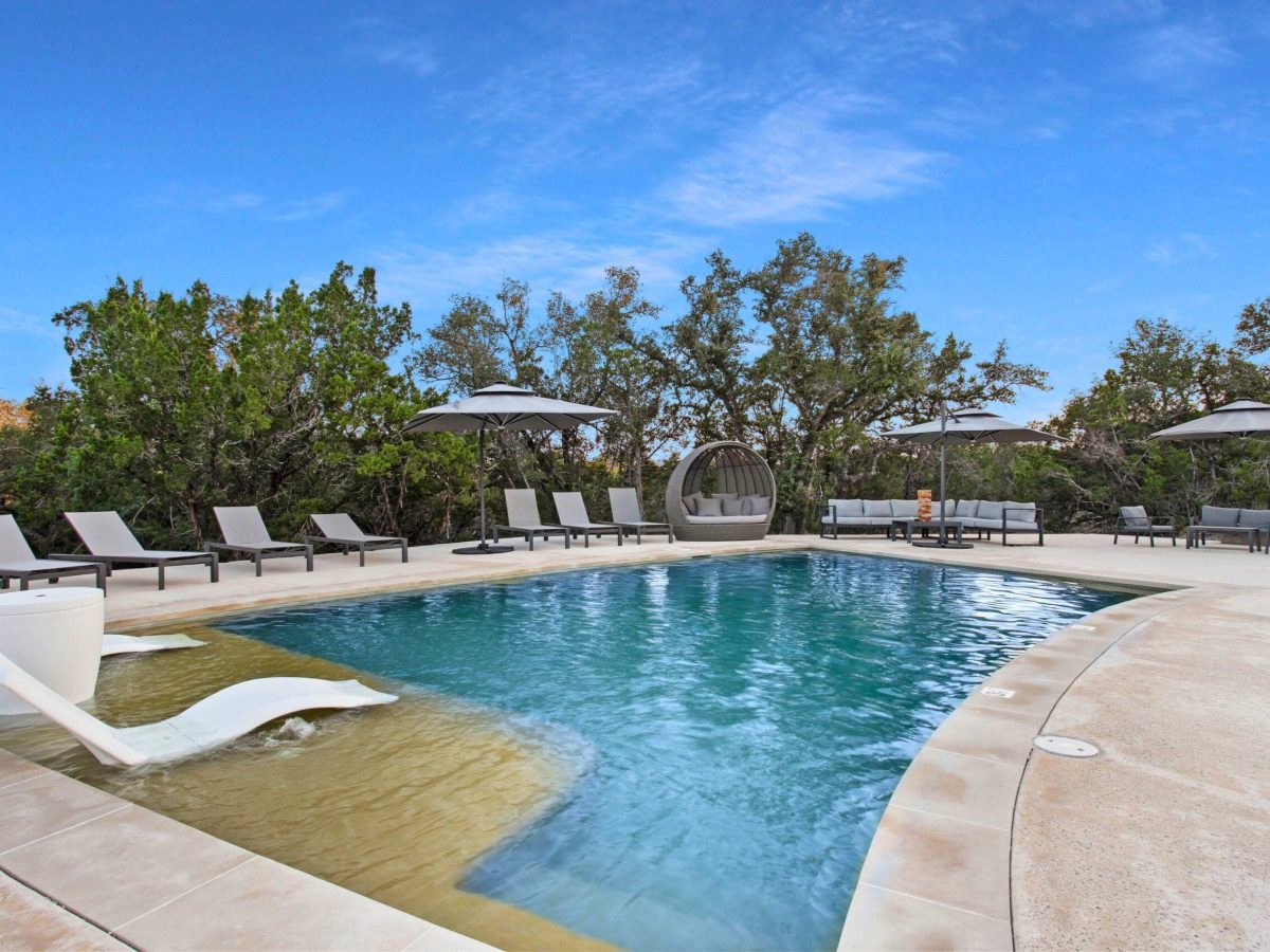 Resort style pool and lounge area at Starlight Horizon in Canyon Lake Texas